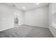 Bright bedroom featuring carpet and a window, illuminated by recessed lighting at 2304 Beeblossom Pl, Fuquay Varina, NC 27526