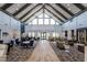 Spacious common area with soaring ceilings, ample seating, and stylish decor throughout at 2316 Beeblossom Pl, Fuquay Varina, NC 27526
