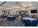 Large common area with plenty of seating, elegant lighting, and stylish decor at 2316 Beeblossom Pl, Fuquay Varina, NC 27526