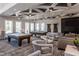 Fun game room featuring pool tables, cozy seating, and ample space for entertaining at 2316 Beeblossom Pl, Fuquay Varina, NC 27526