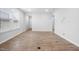 Spacious living room with wood floors, neutral walls, and natural light at 2316 Beeblossom Pl, Fuquay Varina, NC 27526