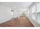 Spacious living room with hardwood floors, neutral walls, and natural light at 2316 Beeblossom Pl, Fuquay Varina, NC 27526