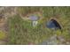 Overhead aerial view of house, pool, and pond in a natural woodland setting at 2411 Lynch Store Rd, Mebane, NC 27302
