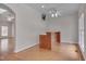 View of a built-in bar area featuring hardwood floors and a ceiling fan at 2411 Lynch Store Rd, Mebane, NC 27302