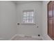 Cozy laundry room with a bright window and convenient connections for your machines at 2411 Lynch Store Rd, Mebane, NC 27302