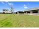 Wide shot of the property including house, barn, sheds and pasture at 2651 Bennett Rd, Creedmoor, NC 27522