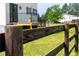 Wooden fence defines the landscape of this inviting yard with lush green grass at 2651 Bennett Rd, Creedmoor, NC 27522