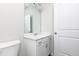 Bathroom featuring a modern vanity with a marble countertop and white cabinetry at 291 Deodora Ln, Cameron, NC 28326
