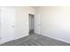 Neutral bedroom with soft carpeting and white doors providing comfortable feel at 291 Deodora Ln, Cameron, NC 28326