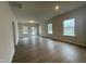 Bright and spacious bonus room featuring ample natural light, beautiful floors, and multiple windows at 291 Deodora Ln, Cameron, NC 28326