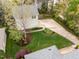 Bird's eye view of a home's backyard with large driveway and manicured landscaping at 30079 Britt, Chapel Hill, NC 27514