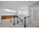 Finished attic space with staircase, built-in bookshelves, and ample lighting at 30079 Britt, Chapel Hill, NC 27514