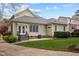 Home featuring a well-manicured backyard with lush green grass and a neutral color scheme at 30079 Britt, Chapel Hill, NC 27514