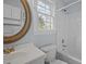 Bathroom featuring a vanity, toilet, and shower/tub combo with neutral fixtures and decor at 30079 Britt, Chapel Hill, NC 27514