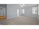 Bright bedroom with wall-to-wall carpet, neutral color and natural light at 30079 Britt, Chapel Hill, NC 27514