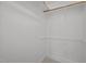 Walk-in closet with neutral colored carpet and shelves and closet rod at 30079 Britt, Chapel Hill, NC 27514