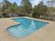 A pristine community pool offers a refreshing escape with clear water and manicured surroundings for residents to enjoy at 30079 Britt, Chapel Hill, NC 27514
