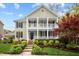 Charming two-story home with a welcoming front porch and well-manicured landscaping at 30079 Britt, Chapel Hill, NC 27514