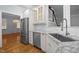 Kitchen showcasing stainless steel appliances, granite countertops, and white cabinetry at 30079 Britt, Chapel Hill, NC 27514