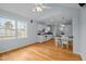 Spacious living room with hardwood floors and bright, natural light, offering an eat-in kitchen at 30079 Britt, Chapel Hill, NC 27514