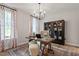 Inviting home office with hardwood floors, ample natural light, and stylish decor, great for working remotely at 303 Augusta Pond Way # 166, Raleigh, NC 27603