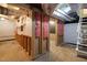 Unfinished basement shows potential with exposed beams and framing, offering customization opportunities at 306 Perry St, Raleigh, NC 27608