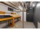 Utility basement features storage and workspace, perfect for hobbies or projects at 306 Perry St, Raleigh, NC 27608