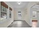 Inviting entryway with light walls, a door to the outside, and a view of the home's interior at 306 Perry St, Raleigh, NC 27608