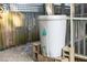 Exterior view showcasing a rainwater collection system for eco-friendly gardening at 306 Perry St, Raleigh, NC 27608