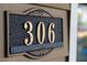 Close-up of the elegant house number '306' on the exterior, adding a touch of style at 306 Perry St, Raleigh, NC 27608
