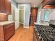 Functional kitchen design provides access to a half-bath and back entry door at 306 Perry St, Raleigh, NC 27608