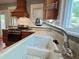 Kitchen sink and countertops provide ample space for food preparation at 306 Perry St, Raleigh, NC 27608