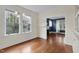 Sunlit living room features hardwood floors and bright natural light at 306 Perry St, Raleigh, NC 27608