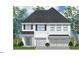 Charming two-story home featuring a symmetrical design, double garage, and classic architectural details at 311 Augusta Pond Way # 168, Raleigh, NC 27603