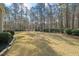 Expansive backyard with lush green grass, providing ample space for recreation and outdoor activities at 36 Wellspring Cir, Clayton, NC 27527