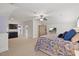 Bedroom showcasing carpet, a wet bar with black cabinets, and an armoire with a television at 36 Wellspring Cir, Clayton, NC 27527