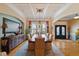 Elegant dining room with a decorative chandelier and beautiful natural light at 36 Wellspring Cir, Clayton, NC 27527