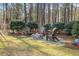 Cozy backyard fire pit area with comfortable seating, perfect for outdoor gatherings and relaxation at 36 Wellspring Cir, Clayton, NC 27527