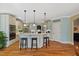 Spacious kitchen with white cabinets, granite countertops, and stainless steel appliances at 36 Wellspring Cir, Clayton, NC 27527