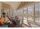 Relaxing screened porch with comfortable seating, perfect for enjoying the outdoors while protected from insects at 36 Wellspring Cir, Clayton, NC 27527