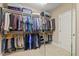 Well-organized walk-in closet features shelving and hanging space for optimal storage and convenience at 36 Wellspring Cir, Clayton, NC 27527