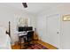 Bedroom with wood floors, built in desk, white trim, and natural light at 508 Currituck Dr, Raleigh, NC 27609