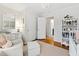 Bright Bedroom with soft carpet, chair, crib, dresser and closet at 508 Currituck Dr, Raleigh, NC 27609