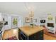 Updated kitchen open to the living room and featuring a butcher block island with seating at 508 Currituck Dr, Raleigh, NC 27609