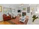 Comfortable living room with fireplace, hardwood floors, bright light and detailed decorations at 508 Currituck Dr, Raleigh, NC 27609