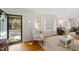 Bright living room with hardwood floors, natural light, and an inviting view of the entry at 508 Currituck Dr, Raleigh, NC 27609