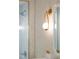 Bathroom featuring a modern vanity, stylish lighting, and a shower over tub at 510 Glenwood Ave # 602, Raleigh, NC 27603