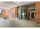 A welcoming covered entrance with brick walls and ample seating at 510 Glenwood Ave # 602, Raleigh, NC 27603