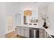 Bright kitchen featuring stainless steel appliances, pendant lighting, and breakfast bar area at 510 Glenwood Ave # 602, Raleigh, NC 27603