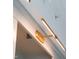 A modern gold light fixture adds a sophisticated touch to the decor at 510 Glenwood Ave # 602, Raleigh, NC 27603